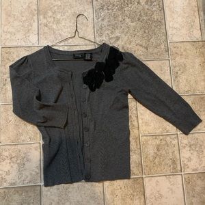 Cute button up blouse... cardigan style